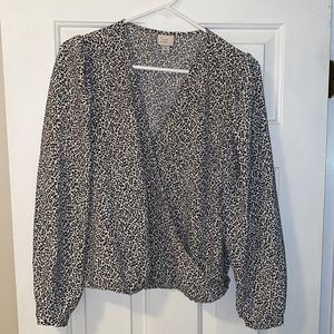 Cute work shirt. Only worn a handful of times.